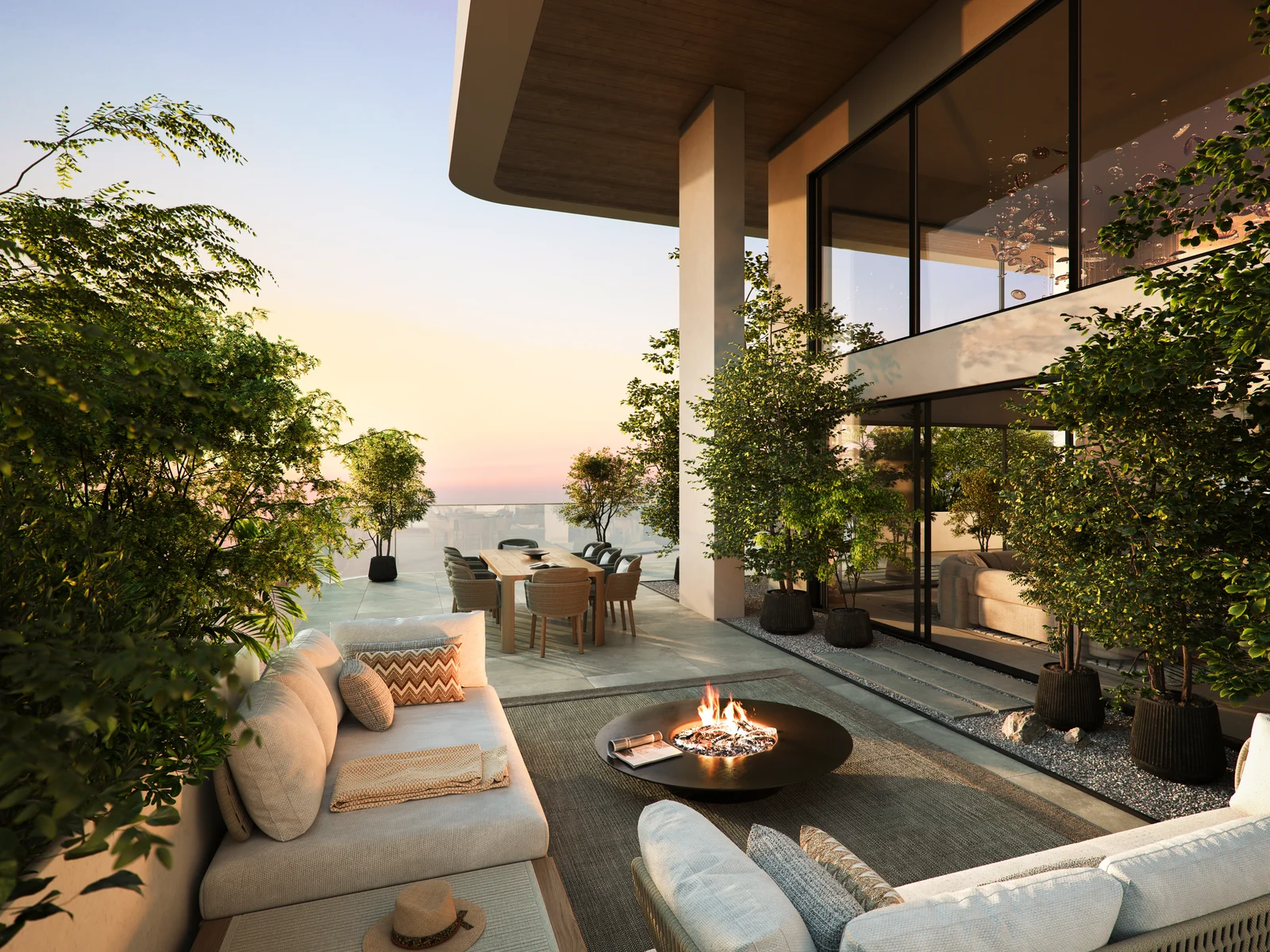 Talea, private Terrasse mit Feuerstelle und Blick auf Meer und Wald bei Sonnenuntergang